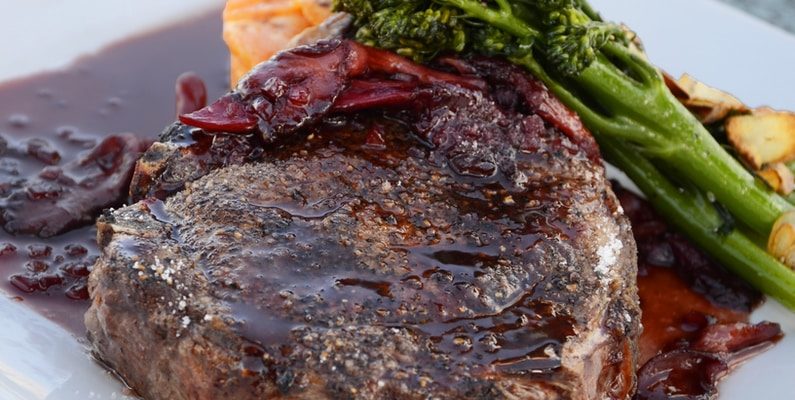 close-up photo of cooked food on square white plate